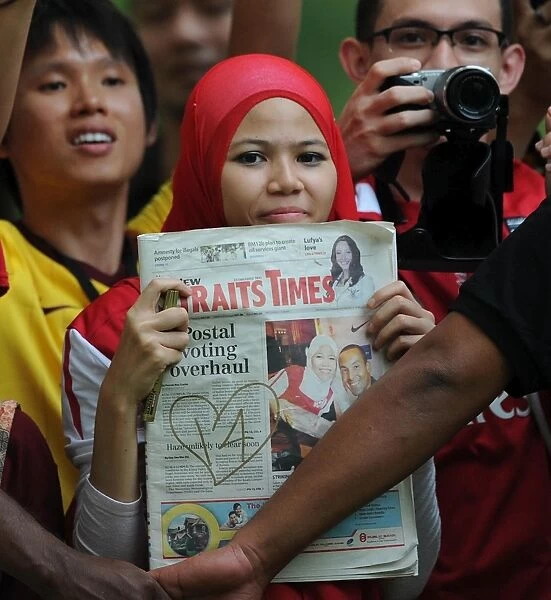 Sea of Red: Arsenal Fans Unite at Suajuna Hotel, Kuala Lumpur (2011)