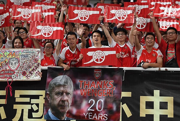 Sea of Red and White: Arsenal Fans Unwavering Support at the Bayern Munich vs Arsenal Pre-Season Friendly in Shanghai, 2017