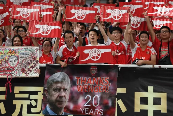 Framed Print : Sea of Red and White: Arsenal Fans Unwavering Support at the Bayern Munich vs Arsenal Pre-Season Friendly in Shanghai, 2017