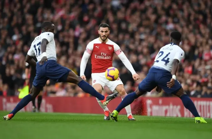 Framed Print : Sead Kolasinac Chips Past Moussa Sissoko and Serge Aurier: Arsenal vs. Tottenham, Premier League 2018-19 Framed Print : Sead Kolasinac Chips Past Moussa Sissoko and Serge Aurier: Arsenal vs. Tottenham, Premier League 2018-19