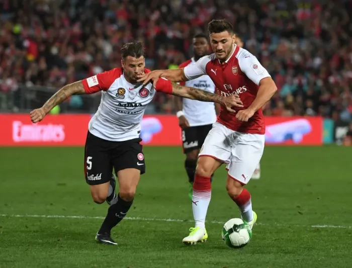Framed Print : Sead Kolasinac vs. Brendan Hamill: A Clash of Forces in Sydney Football