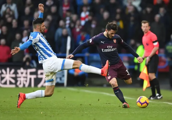 Framed Print : Sead Kolasinac vs. Christopher Schindler: Intense Clash in Huddersfield Town vs. Arsenal FC Premier League Match Framed Print : Sead Kolasinac vs. Christopher Schindler: Intense Clash in Huddersfield Town vs. Arsenal FC Premier League Match