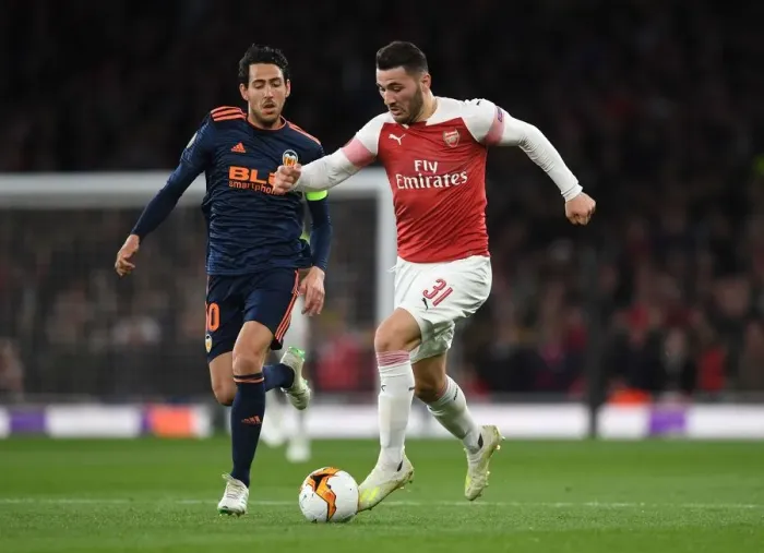 Framed Print : Sead Kolasinac vs. Daniel Parejo: Arsenal vs. Valencia - UEFA Europa League Semi-Final Showdown