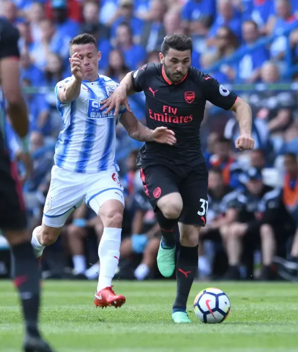 Framed Print : Sead Kolasinac vs. Jonathan Hogg: Intense Battle in Huddersfield Town vs. Arsenal Premier League Clash