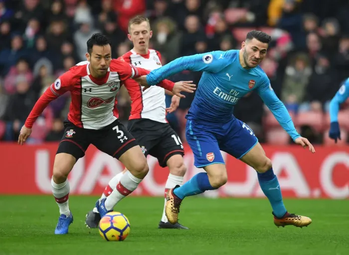 Framed Print : Sead Kolasinac vs Maya Yoshida: Intense Battle at Southampton v Arsenal, Premier League 2017-18