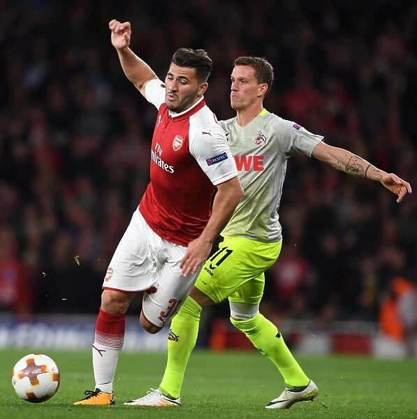 Sead Kolasinac vs. Simon Zoller: Intense Battle at the Emirates - Arsenal FC vs. 1. FC Koeln, UEFA Europa League