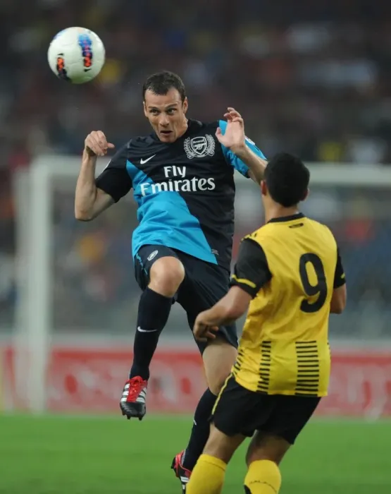 Framed Print : Sebastien Squillaci (Arsenal) Norshahrul Talaha (Malaysia). Malaysia XI 0: 4 Arsenal