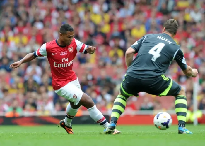 Framed Print : Serge Gnabry (Arsenal) Robert Huth (Stoke). Arsenal 3: 1 Stoke City. Barclays Premier League Framed Print : Serge Gnabry (Arsenal) Robert Huth (Stoke). Arsenal 3: 1 Stoke City. Barclays Premier League