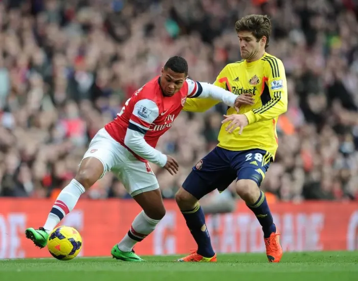Framed Print : Serge Gnabry vs. Marcos Alonso: Intense Battle at Arsenal v Sunderland, Premier League 2013-14 Framed Print : Serge Gnabry vs. Marcos Alonso: Intense Battle at Arsenal v Sunderland, Premier League 2013-14