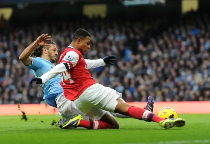 Framed Print : Serge Gnabry vs. Martin Demichelis: A Battle at the Etihad - Manchester City vs. Arsenal, Premier League, 2013