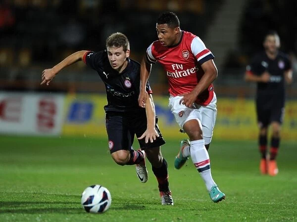Serge Gnabry's Agile Moves: Outshining Dimitrios Voutsiotis in Arsenal U19's NextGen Series Match against Olympiacos
