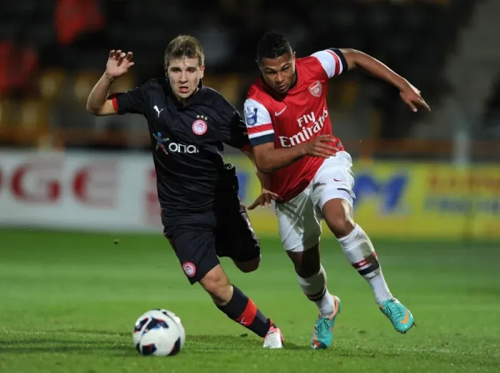Framed Print : Serge Gnabry's Breakout Performance: Outshining Dimitrios Voutsiotis in Arsenal U19's Victory over Olympiacos, 2012