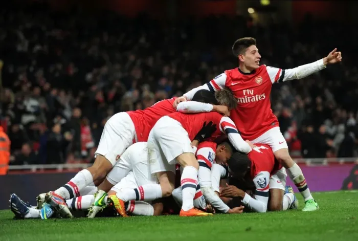 Framed Print : Serge Gnabry's Stunner: Arsenal U19s Celebrate in Quarter Final Victory