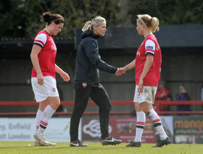 Framed Print : Shelley Kerr and Gilly Flaherty: A Moment of Sportsmanship in the Arsenal Ladies FC vs. VfL Wolfsburg UEFA Women's Champions League Semi-Final