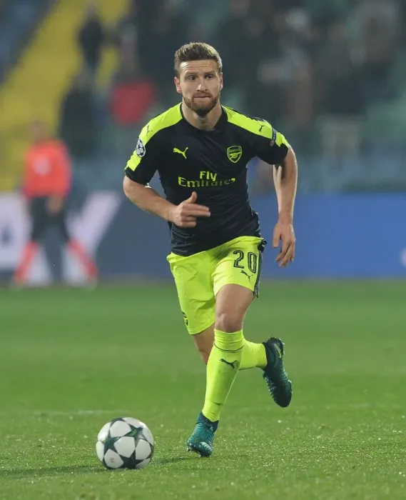 Framed Print : Shkodran Mustafi: Arsenal's Unyielding Defender in UEFA Champions League Clash against Ludogorets, 2016