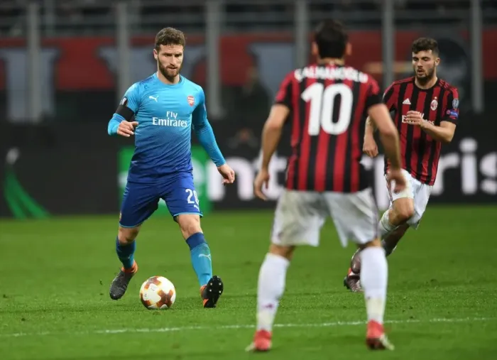 Framed Print : Shkodran Mustafi Focuses in AC Milan vs Arsenal Europa League Clash