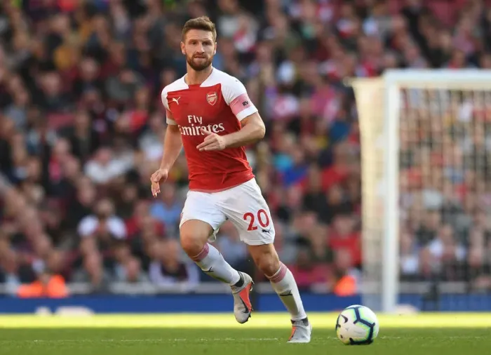 Framed Print : Shkodran Mustafi Focuses in Arsenal's Battle Against Watford (2018-19)