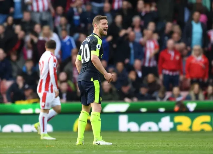 Framed Print : Shkodran Mustafi Focuses in Stoke City vs Arsenal Premier League Clash