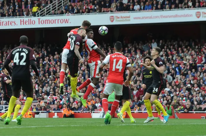 Framed Print : Shkodran Mustafi's Stunner: Arsenal's Game-Changing Goal vs. Manchester City (April 2017)