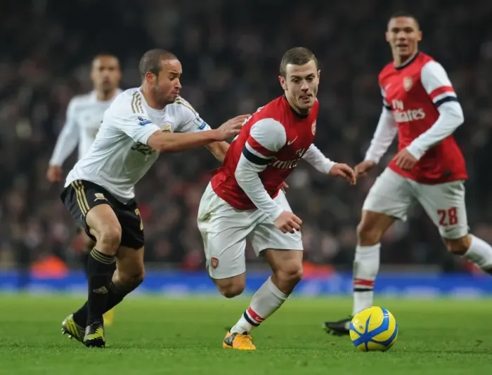 Framed Print : Showdown at the Emirates: Wilshere vs. Richards in FA Cup Third Round Replay
