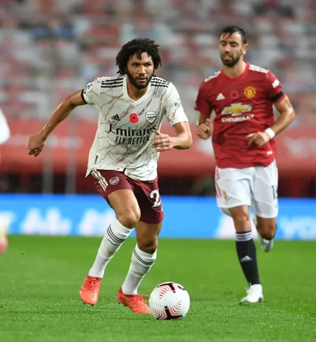 Framed Print : Silent Warrior at Old Trafford: Mo Elneny's Battle in Empty Premier League Stands (Manchester United vs. Arsenal, 2020-21) Framed Print : Silent Warrior at Old Trafford: Mo Elneny's Battle in Empty Premier League Stands (Manchester United vs. Arsenal, 2020-21)