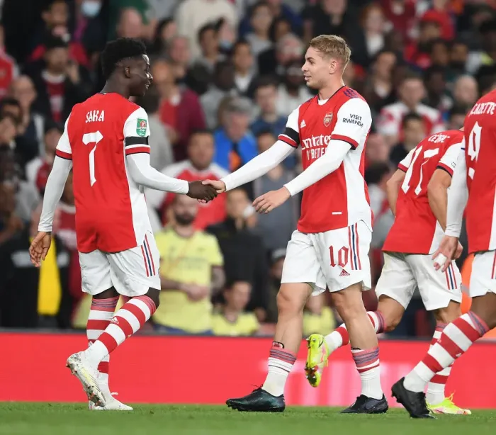 Framed Print : Smith Rowe and Saka in Jubilant Moment as Arsenal Scores Three against AFC Wimbledon