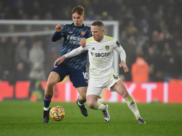 Framed Print : Smith Rowe vs. Forshaw: A Premier League Battle at Elland Road