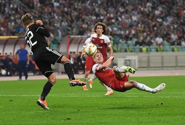 Smith Rowe vs Jeznicak: Intense Moment in Qarabag vs Arsenal UEFA Europa League Clash