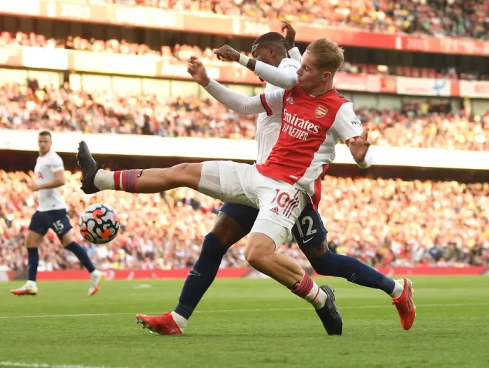 Framed Print : Smith Rowe vs. Royal: A Winged Battle in the Arsenal vs. Tottenham Rivalry