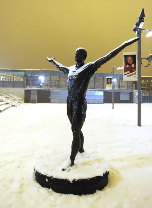 Framed Print : Snowy Emirates Stadium: Arsenal's Winter Battle in the Heart of Premier League Action