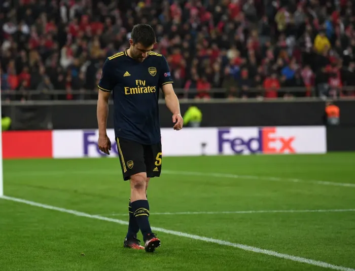 Framed Print : Sokratis of Arsenal in Action against Olympiacos in UEFA Europa League Round of 32 First Leg