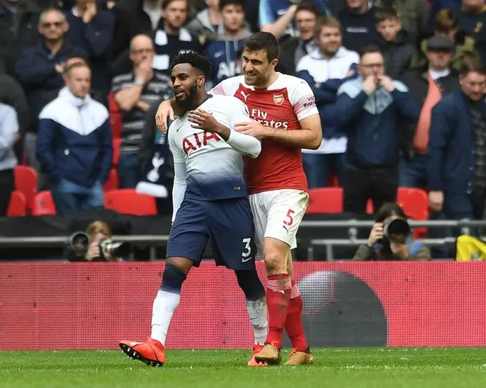 Framed Print : Sokratis and Danny Rose Embrace Amidst Premier League Rivalry: Tottenham vs. Arsenal Framed Print : Sokratis and Danny Rose Embrace Amidst Premier League Rivalry: Tottenham vs. Arsenal