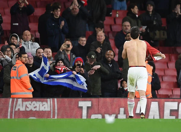 Sokratis Honors Greek Fans with Shirt after Arsenal's Victory over Huddersfield Town