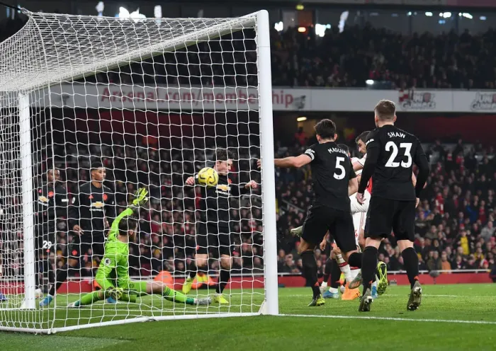 Framed Print : Sokratis Surprise Strike: Arsenal's Equalizer Against Manchester United, Premier League 2019-2020