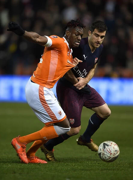 Sokratis vs Gnanduillet: Intense Clash in FA Cup Third Round between Blackpool and Arsenal