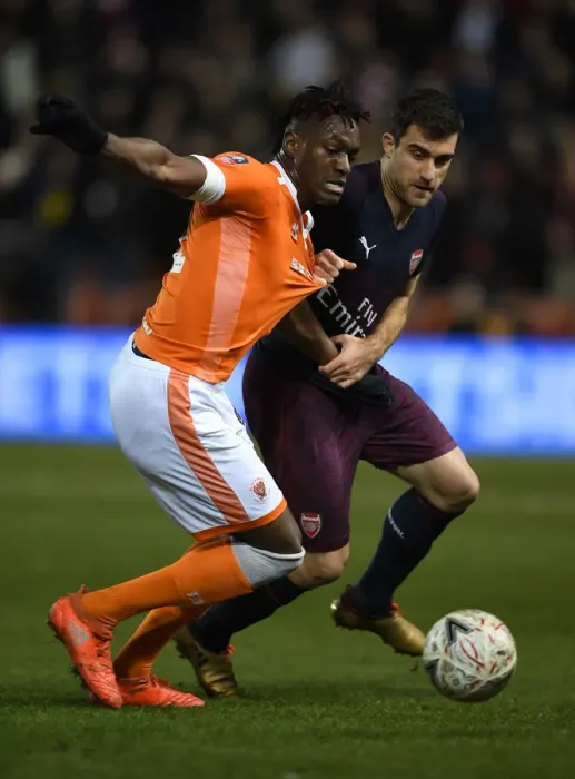 Framed Print : Sokratis vs Gnanduillet: Intense Clash in FA Cup Third Round between Blackpool and Arsenal Framed Print : Sokratis vs Gnanduillet: Intense Clash in FA Cup Third Round between Blackpool and Arsenal