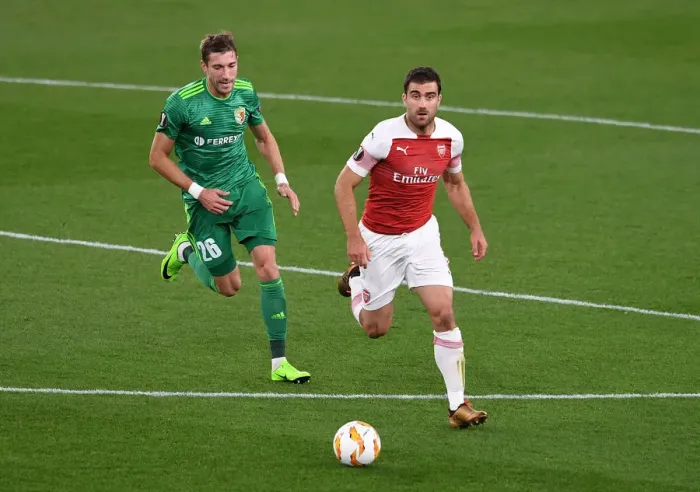 Framed Print : Sokratis vs. Kolomoets: A Europa League Showdown at Emirates Stadium