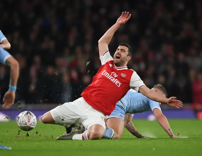 Framed Print : Sokratis vs Phillips: FA Cup Battle at Emirates Stadium Framed Print : Sokratis vs Phillips: FA Cup Battle at Emirates Stadium