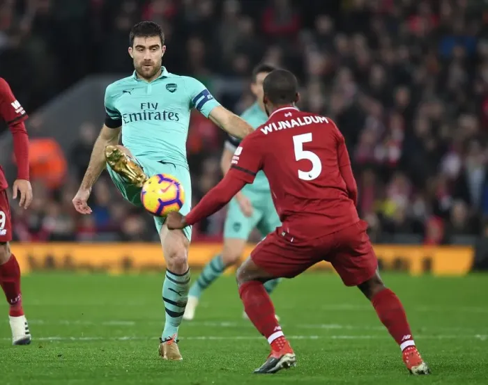 Framed Print : Sokratis vs. Wijnaldum: Intense Battle at Anfield - Liverpool vs. Arsenal, Premier League 2018-19