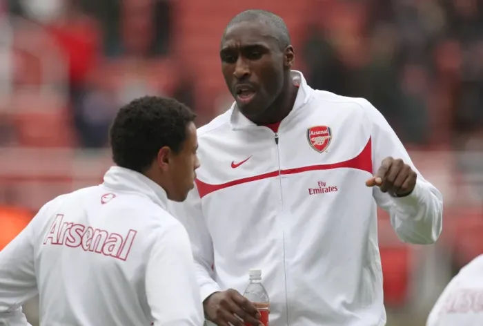 Framed Print : Sol Campbell Counsels Coquelin Before the Storm: Arsenal's FA Cup Battle at Stoke City