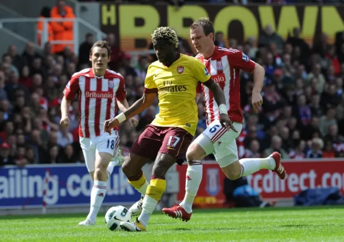 Framed Print : Song vs. Whelan: Stoke's Surprise 3-1 Victory Over Arsenal in Premier League, 2011