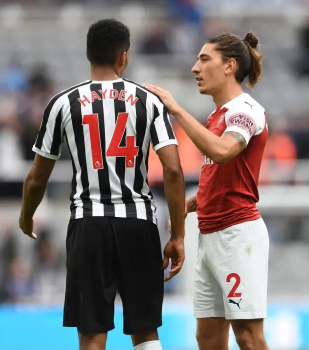 Framed Print : Sportsmanship Prevails: Heartfelt Chat Between Bellerin and Hayden Amidst Newcastle-Arsenal Rivalry