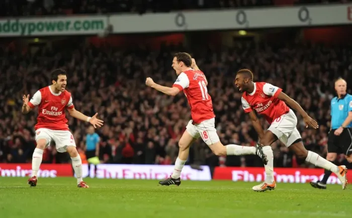 Framed Print : Squillaci, Djourou, and Fabregas: Arsenal's Triumphant Goal Celebration vs. Stoke City (1:0), 2011