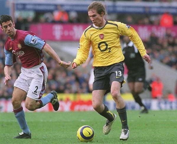 Stalemate at Villa Park: Alex Hleb vs Mark Delaney in the 0-0 Arsenal-Aston Villa FA Premiership Clash, December 2005