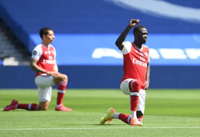 Framed Print : Empty Stands: Pepe Takes a Knee as Arsenal Face Brighton in Pandemic-Hit Premier League Framed Print : Empty Stands: Pepe Takes a Knee as Arsenal Face Brighton in Pandemic-Hit Premier League