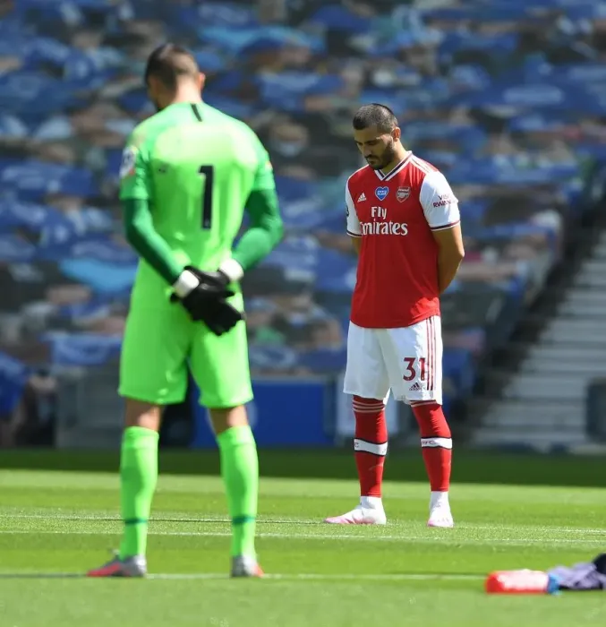 Framed Print : Empty Stands: Sead Kolasinac Honors Silence at Brighton vs. Arsenal (2019-20) Framed Print : Empty Stands: Sead Kolasinac Honors Silence at Brighton vs. Arsenal (2019-20)
