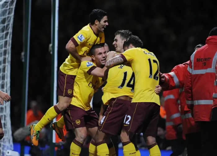 Framed Print : Four Stars: Walcott, Podolski, Ramsey, and Giroud Celebrate Arsenal's Win Against West Ham United (2012-13) Framed Print : Four Stars: Walcott, Podolski, Ramsey, and Giroud Celebrate Arsenal's Win Against West Ham United (2012-13)