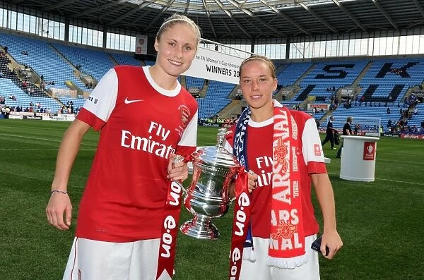 Steph Houghton and Jordan Nobbs (Arsenal) with the FA Cup Trophy. Arsenal Ladies 2