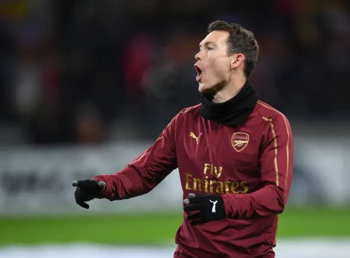 Framed Print : Stephan Lichtsteiner Gears Up: Arsenal vs BATE Borisov, UEFA Europa League Round of 32 (First Leg)