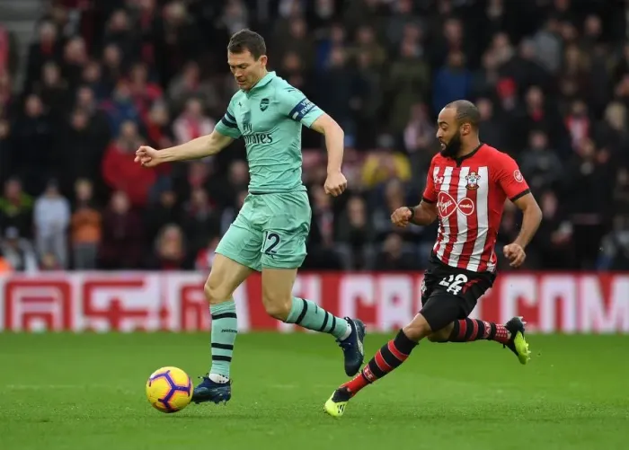 Framed Print : Stephan Lichtsteiner vs. Nathan Redmond: Battle at St. Mary's - Southampton v Arsenal (2018-19)